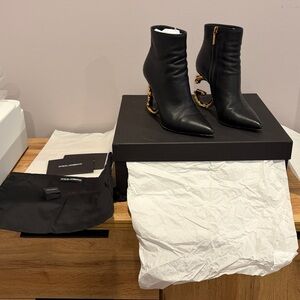 Dolce & Gabbana Black Heeled Boots with Gold Accent